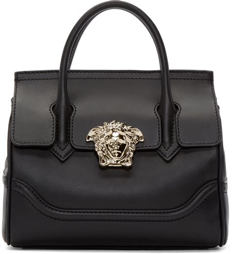 versace two open pocket handbag ii in black|versace black leather bag.